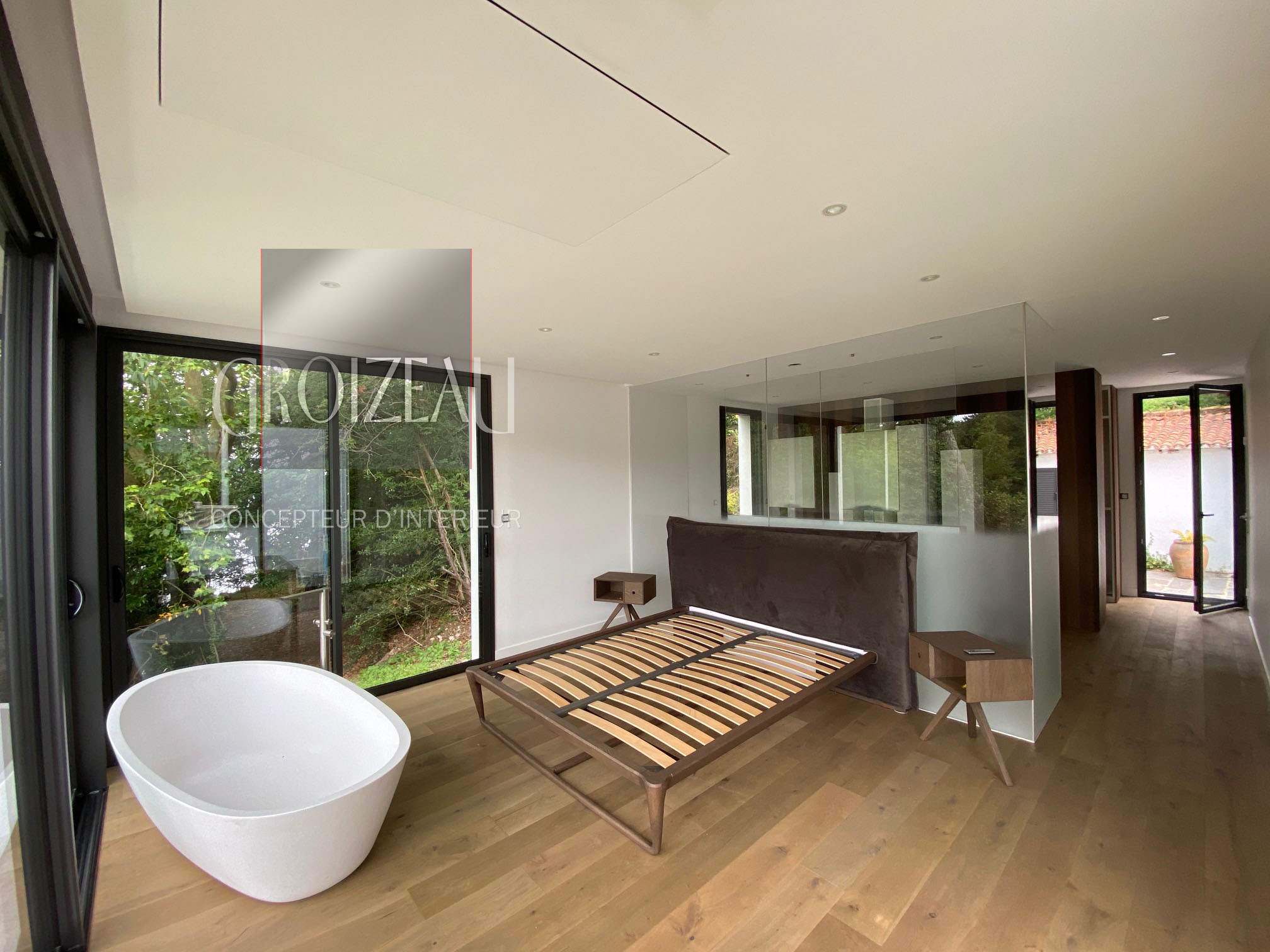 Bungalow accueillant la salle de bain, la chambre et un dressing